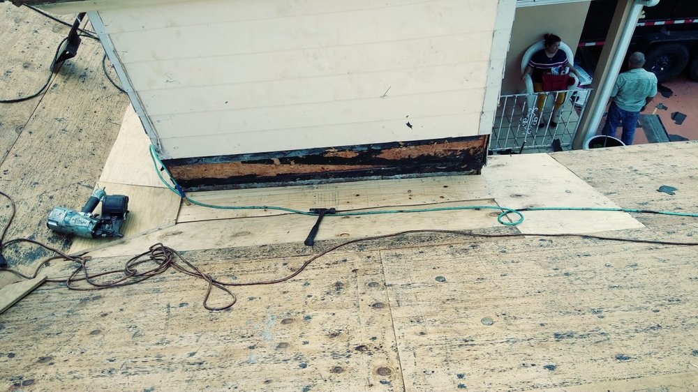 Slide of D-Tech Roofing