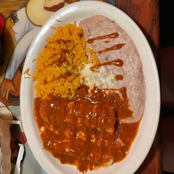 El Mezcal Mexican Restaurant - 2 beef enchiladas with rice and beans (Valentino sauce on top)