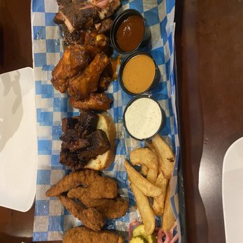 Famous Dave's - Barbecue sampler appetizer Chicken fingers, steak cubes, buffalo chicken wing and rib tips - Barbeque Near Me - Doral, Florida Famous Dave's - Barbecue sampler appetizer Chicken fingers, steak cubes, buffalo chicken wing and rib tips - Barbeque Near Me - Doral, Florida