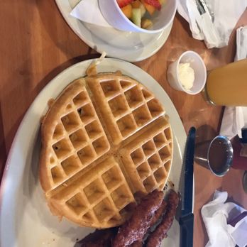 Cypress Breakfast House - Chicken and Waffles with a side of fruit. - Breakfast & Brunch Near Me - Cypress, Texas