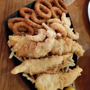 Pier 76 Fish Grill - Sampler.. calamari, fried shrimp, fried fish, and fries..(long John silver's vibes, but better ) - Seafood Near Me - Riverside, California