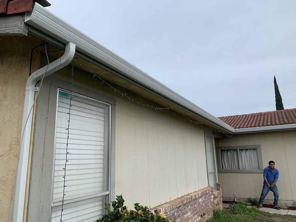 Slide of ML Gutters & Roofing