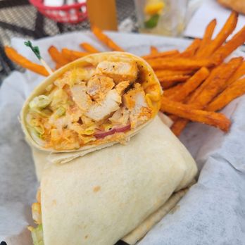 Water's Edge Sports Grill - Buffalo Chicken wrap with sweet potato fries - Sports Bars Near Me - Galena, Ohio Water's Edge Sports Grill - Buffalo Chicken wrap with sweet potato fries - Sports Bars Near Me - Galena, Ohio