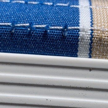 Ard's Awning & Upholstery - Stitching removed leaving holes. - Awnings Near Me - Winter Haven, Florida Ard's Awning & Upholstery - Stitching removed leaving holes. - Awnings Near Me - Winter Haven, Florida
