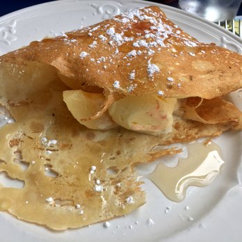 Au Petit Coin Breton - The Mont St-Michel, pear and ice cream drizzled with light maple syrup enfolded into a very crispy and delicious crepe. - Creperies Near Me - Quebec City, Quebec Au Petit Coin Breton - The Mont St-Michel, pear and ice cream drizzled with light maple syrup enfolded into a very crispy and delicious crepe. - Creperies Near Me - Quebec City, Quebec