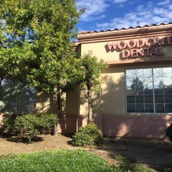 James Witcher, DDS - Woodcreek Dental - Back of the office with a large parking lot.