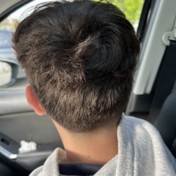 Reflections Hair Design - Short and sassy cut for the boy.