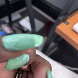 Red Lotus Spa & Nails - Left thumb layer peeled in less than 24 hrs.