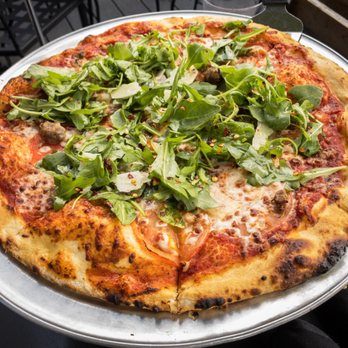 Social Pie - Sausage+Arugula - red sauce, fresh tomato, shaved manchego - Pizza Near Me - Dallas, Texas Social Pie - Sausage+Arugula - red sauce, fresh tomato, shaved manchego - Pizza Near Me - Dallas, Texas