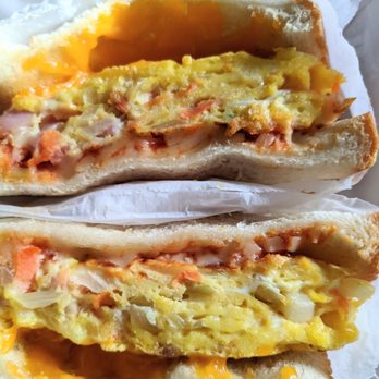 Lulu & Dino - Canaan Signature Toast Sammy: eggs, cheese, carrots and onions. - Coffee & Tea Near Me - Bayside, New York Lulu & Dino - Canaan Signature Toast Sammy: eggs, cheese, carrots and onions. - Coffee & Tea Near Me - Bayside, New York