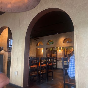El Chico - a man sitting at a table in a restaurant - Mexican Near Me - Knoxville, Tennessee