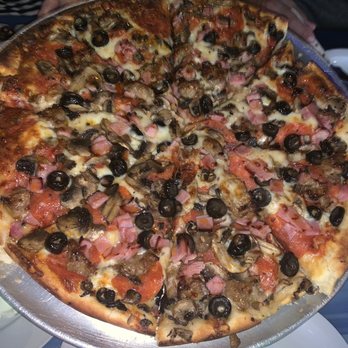 Dollies Pub & Cafe - Meat lovers pizza large - Pizza Near Me - Lahaina, Hawaii