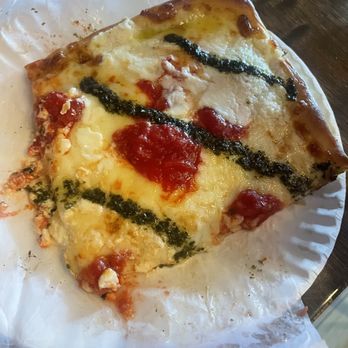 Pienezza Pizza - Sicilian slice with pesto, ricotta and mozzarella - Pizza Near Me - Kissimmee, Florida Pienezza Pizza - Sicilian slice with pesto, ricotta and mozzarella - Pizza Near Me - Kissimmee, Florida