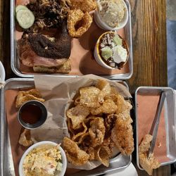 Home Team BBQ - Pork Cracklin's with pimento cheese, the three meat combo pulled pork, jalapeño cheddar sausage, and 1/4 chicken, dark meat.l