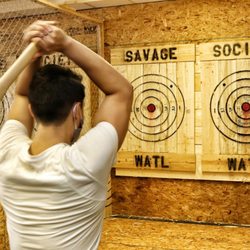 Savage society axe throwing