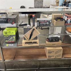 The Battery Exchange - Auto parts display case: NEBO light, jump starter, pocket knife, etc