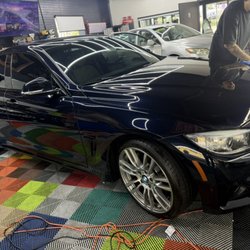 OC Tint & Detail - Paint correction at its finest! This car came in looking pretty used and left with a mirror finish after a full correction and ceramic spray