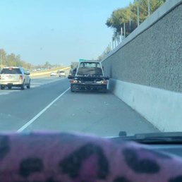 West coast driver pulling up to tow my car on the freeway. THANK YOU! West coast driver pulling up to tow my car on the freeway. THANK YOU!