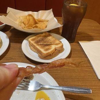 Denny's - New super slam Bacon so thin you can read the menu through. Old photo was a while back. Notice the difference. - Diners Near Me - Colton, California