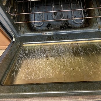 Keller Williams Realty - Keller Williams agents idea of closing day cleaning of stove - Real Estate Services Near Me - San Antonio, Texas