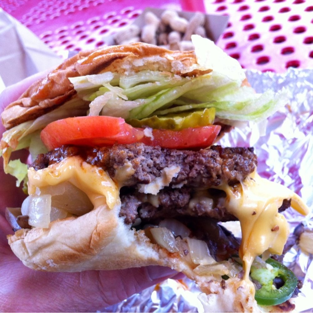 Five Guys - Cheeseburger....with one bite out of it.  Could barely get my mouth around this monster. - Burgers Near Me - Germantown, Maryland