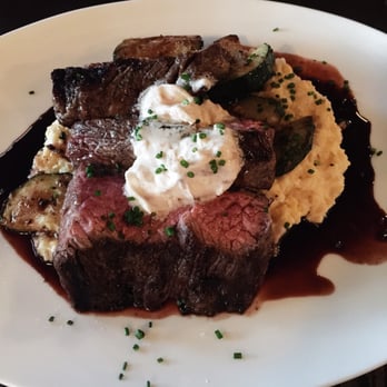 The Roosevelt - Steak over cheese grits and veggies - Southern Near Me - Richmond, Virginia The Roosevelt - Steak over cheese grits and veggies - Southern Near Me - Richmond, Virginia