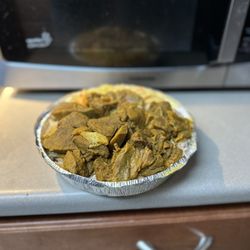 People's Choice Jamaican American Restaurant - Curry Goat, rice, beans and veggies (cabbage). It was also advertised with plantains but I didn't get them, not sure if that was an error)