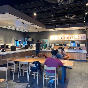 Starbucks - people sitting at tables in a coffee shop - Coffee & Tea Near Me - Winter Park, Florida Starbucks - people sitting at tables in a coffee shop - Coffee & Tea Near Me - Winter Park, Florida