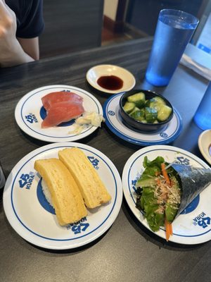 Kura Revolving Sushi Bar by null
