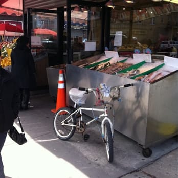 Im Mondello Fish Store - a bicycle parked in front of a fish stand - Seafood Markets Near Me - Brooklyn, New York Im Mondello Fish Store - a bicycle parked in front of a fish stand - Seafood Markets Near Me - Brooklyn, New York