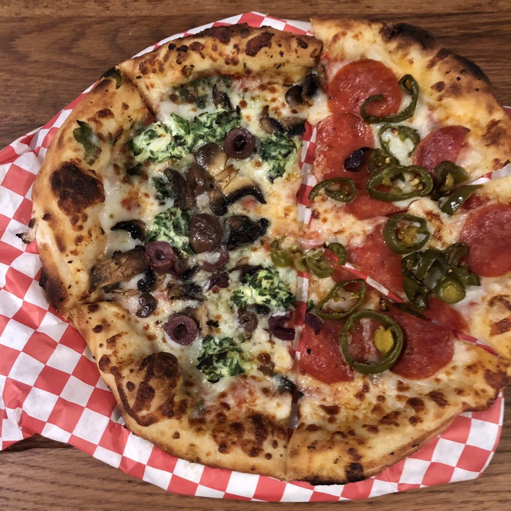 Hobo Co Pizza - 1/2 pepperoni and jalapeño, 1/2 make your own (mushrooms, kalamata olives, spinach ricotta, and pesto) - Food Trucks Near Me - Anaheim, California Hobo Co Pizza - 1/2 pepperoni and jalapeño, 1/2 make your own (mushrooms, kalamata olives, spinach ricotta, and pesto) - Food Trucks Near Me - Anaheim, California