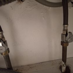 Big Apple Plumbing - Shut off valves and coiled water lines attached to upper faucet lines done. Not by Big Apple with an extra $800 plus in my pocket!