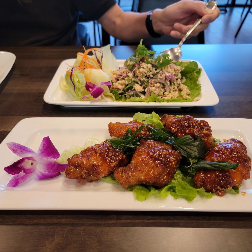 Thai Square - A live orchid blossom graces many of the dishes. - Thai Near Me - Sugar Land, Texas Thai Square - A live orchid blossom graces many of the dishes. - Thai Near Me - Sugar Land, Texas