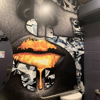 Bank Street Patio Bar - Bathroom art pretty dope - Bars Near Me - Ocala, Florida Bank Street Patio Bar - Bathroom art pretty dope - Bars Near Me - Ocala, Florida