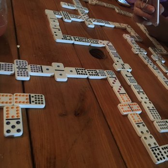 NettBar - Picnic tables of dominos - Cocktail Bars Near Me - Houston, Texas