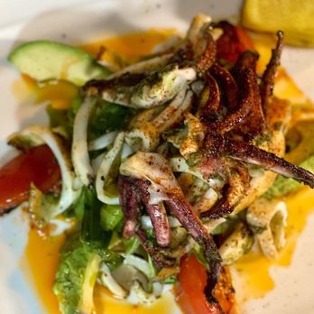 Appetit Bistro - a white plate with a salad on it - French Near Me - Norwalk, Connecticut Appetit Bistro - a white plate with a salad on it - French Near Me - Norwalk, Connecticut