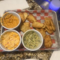 Moochies Tavern - Spinach dip, pimento cheese dip and red pepper hummus with garlic pita chips so dank