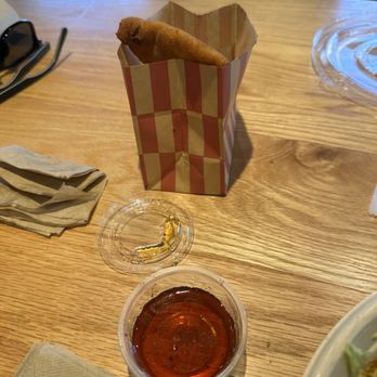 CAVA - Pita chips covered in cinnamon sugar served with honey - Mediterranean Near Me - Moreno Valley, California