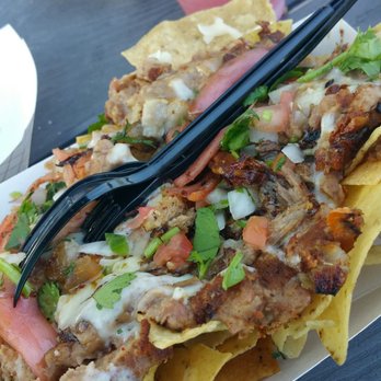 Sanchos - Pork Belly Nachos. These were up to par. Sweet onions delicious. - Cocktail Bars Near Me - San Antonio, Texas Sanchos - Pork Belly Nachos. These were up to par. Sweet onions delicious. - Cocktail Bars Near Me - San Antonio, Texas