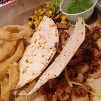 Alumni Grill - Grill shrimp tacos, with side of onion rings. - Salad Near Me - Thibodaux, Louisiana Alumni Grill - Grill shrimp tacos, with side of onion rings. - Salad Near Me - Thibodaux, Louisiana