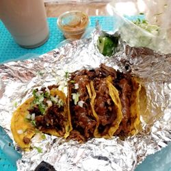 Tacos El Pecas - 4 tacos and a large drink ($15)