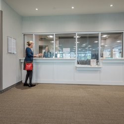 Augusta Oncology - A patient checks in at Patient Registration at Augusta Oncology's downtown location.