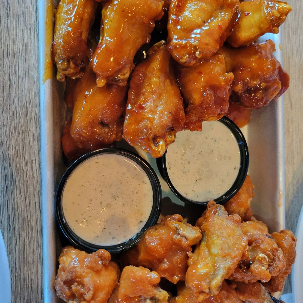 Two Cities Pizza - 1/2 sweet chili 1/2 buffalo wings with ranch dressing - Pizza Near Me - Suwanee, Georgia Two Cities Pizza - 1/2 sweet chili 1/2 buffalo wings with ranch dressing - Pizza Near Me - Suwanee, Georgia