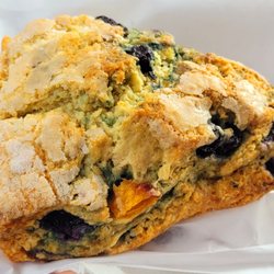 Coffee Cup - Warm blueberry peach scone. Bomb.
