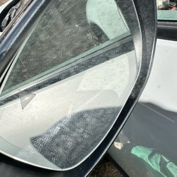 Shell - Dirty side mirror.