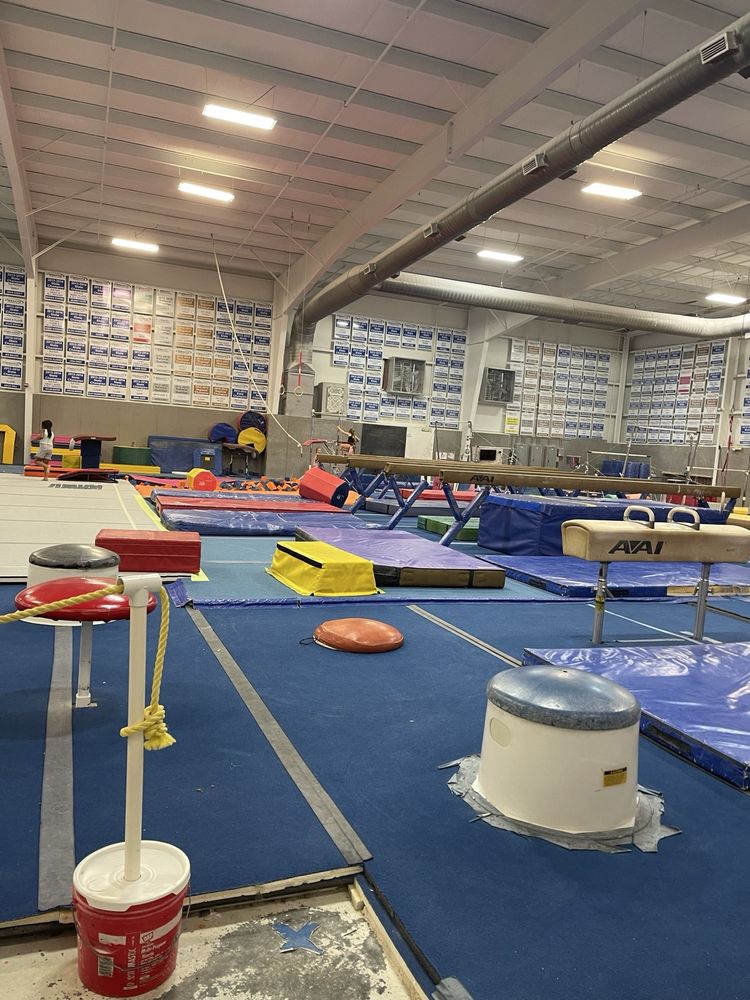 Gymnastix Training Center Logo