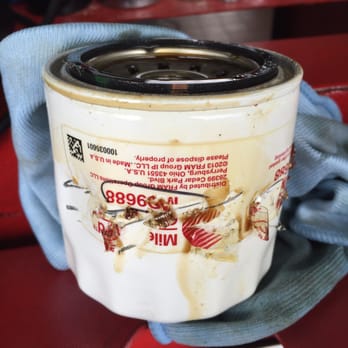 Jiffy Lube Oil Change - Incorrect oil filter is slimy with oil which dropped onto exhaust system and made the car rank with the odor of burnt oil. - Auto Repair Near Me - Moorpark, California Jiffy Lube Oil Change - Incorrect oil filter is slimy with oil which dropped onto exhaust system and made the car rank with the odor of burnt oil. - Auto Repair Near Me - Moorpark, California