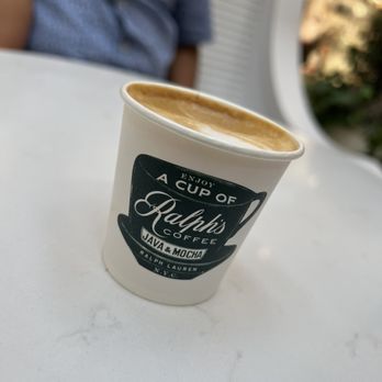 Ralph’s Coffee - a cup of coffee on a table - Coffee & Tea Near Me - Miami, Florida
