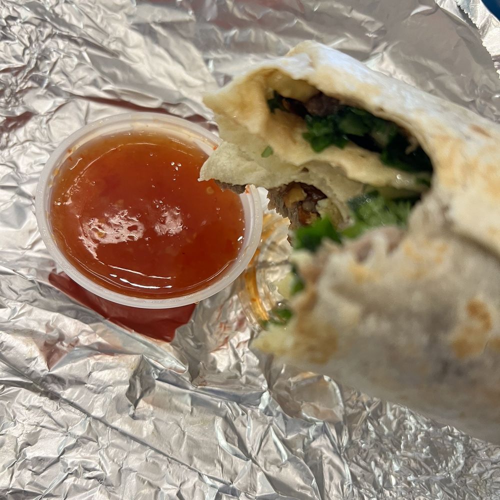 SPRO CoffeeLab - Duck burrito and sauce - Coffee & Tea Near Me - San Francisco, California SPRO CoffeeLab - Duck burrito and sauce - Coffee & Tea Near Me - San Francisco, California