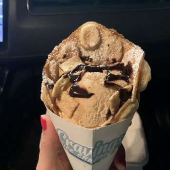 Cravings Ice Cream - Dulce de leche ice cream with Cinnamon Toast Crunch and chocolate drizzle in a "puffle" cone - Ice Cream & Frozen Yogurt Near Me - Bellflower, California